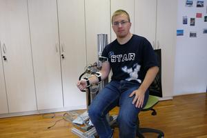 Miha tests the elbow exoskeleton